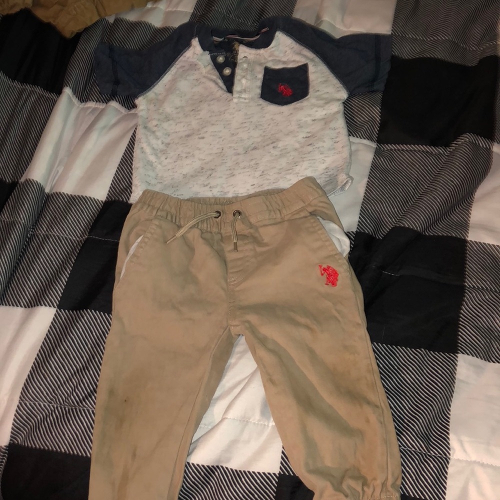 A two piece polo shirt and pants for kids
